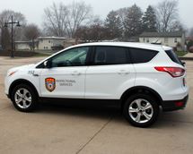 A white SUV type car.